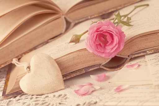 Pink flowers and old books
